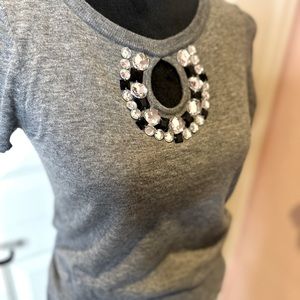 Gray blouse with rhinestones size 10 elastic.